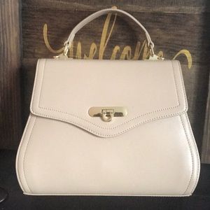 Nude/natural colored women’s Kadell handbag